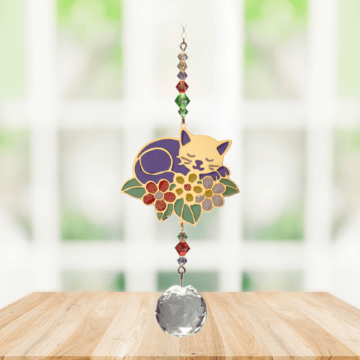 Wild Things Cat on Leaf multicolour crystal suncatcher hanging in a window with coloured crystal beads and clear prism
