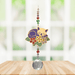 Wild Things Cat on Leaf multicolour crystal suncatcher hanging in a window with coloured crystal beads and clear prism
