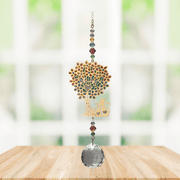 Wild Things Cat Under Tree multi-coloured crystal suncatcher hanging in a window with coloured beads and clear crystal prism
