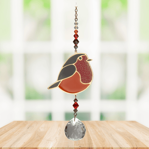 Wild Things Crystal Dreams Robin suncatcher hanging by a window with russet red bird and crystal drop