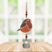 Wild Things Crystal Dreams Robin suncatcher hanging by a window with russet red bird and crystal drop