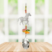 Wild Things Crystal Fantasy Horse suncatcher hanging by a window with tropical coloured crystals