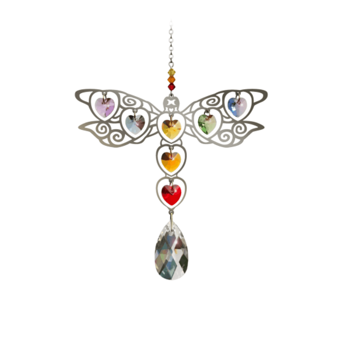 Large polished-metal dragonfly suncatcher with rainbow heart crystals on white background


