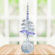 Wild Things Light Amethyst February birthstone crystal suncatcher hanging by window with 20mm ball pendant