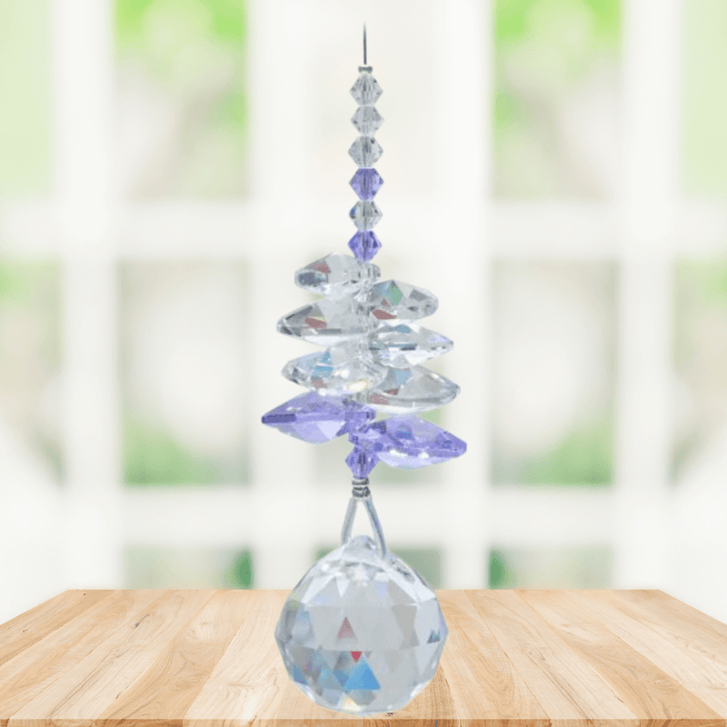 Wild Things Light Amethyst February birthstone crystal suncatcher hanging by window with 20mm ball pendant