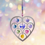 Heart of Hearts Confetti suncatcher sparkling against a pastel bokeh backdrop, ready to cast rainbows

