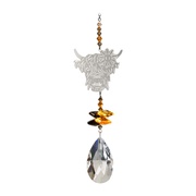 Wild Things Highland Cow Autumn Gold crystal suncatcher with silver cow design, amber crystals and clear teardrop prism on plain background