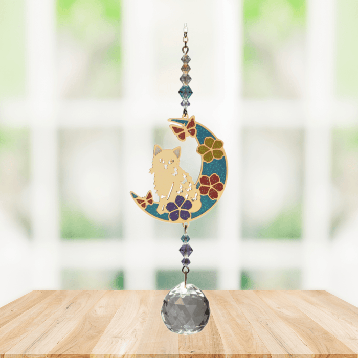 Wild Things Kitty on Moon multicolour crystal suncatcher hanging in a window with crystal beads and clear prism
