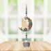 Wild Things Kitty on Moon multicolour crystal suncatcher hanging in a window with crystal beads and clear prism
