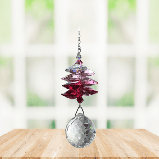 Wild Things deep rose cascade crystal suncatcher in window with clear 20mm ball pendant, rainbow maker