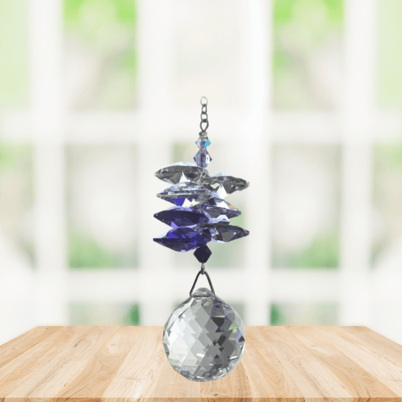 Wild Things purple cascade crystal suncatcher in window with clear 20mm ball pendant, rainbow maker