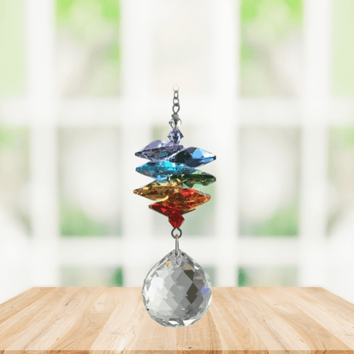 Wild Things rainbow cascade crystal suncatcher in window with clear 20mm ball pendant, rainbow maker