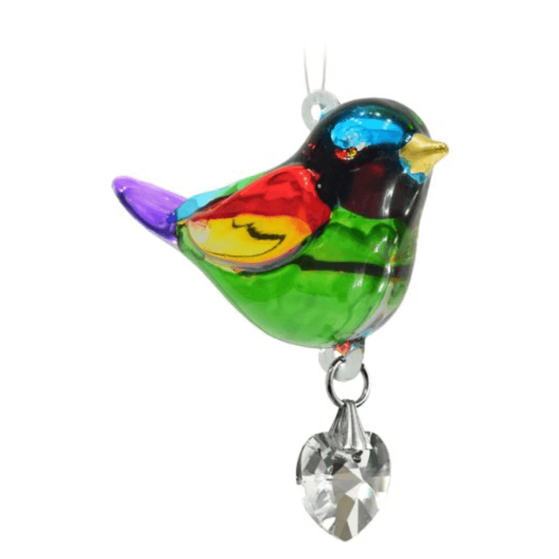 Close-up of multi-hued Rainbow crystal suncatcher with heart-cut prism on white background

