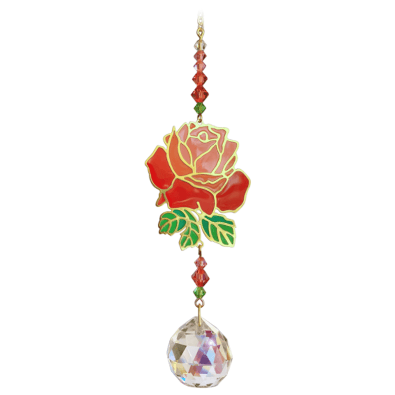 Rose Crystal Suncatcher on white backdrop – scarlet rose bloom with gold outline, ruby-emerald bead run and 20 mm crystal prism.
