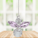 Small rose guardian angel Swarovski crystal suncatcher sparkling in a bright window