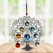 Tree of Life Chakra large suncatcher with rainbow crystals displayed on a wooden table

