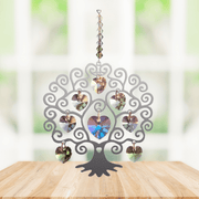 Tree of Life spring suncatcher with soft-tone crystal hearts displayed on a wooden table

