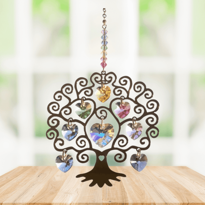 Tree of Life summer suncatcher with rainbow crystal hearts displayed on a wooden table

