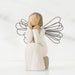 Willow Tree Angel of Caring Figurine with wire wings on a marble background