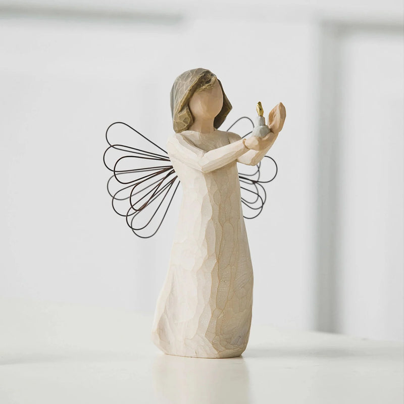 Willow Tree Angel of Hope Figurine lit by soft daylight