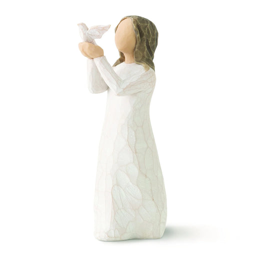 Willow Tree Soar figurine holding a white dove, wearing a white gown