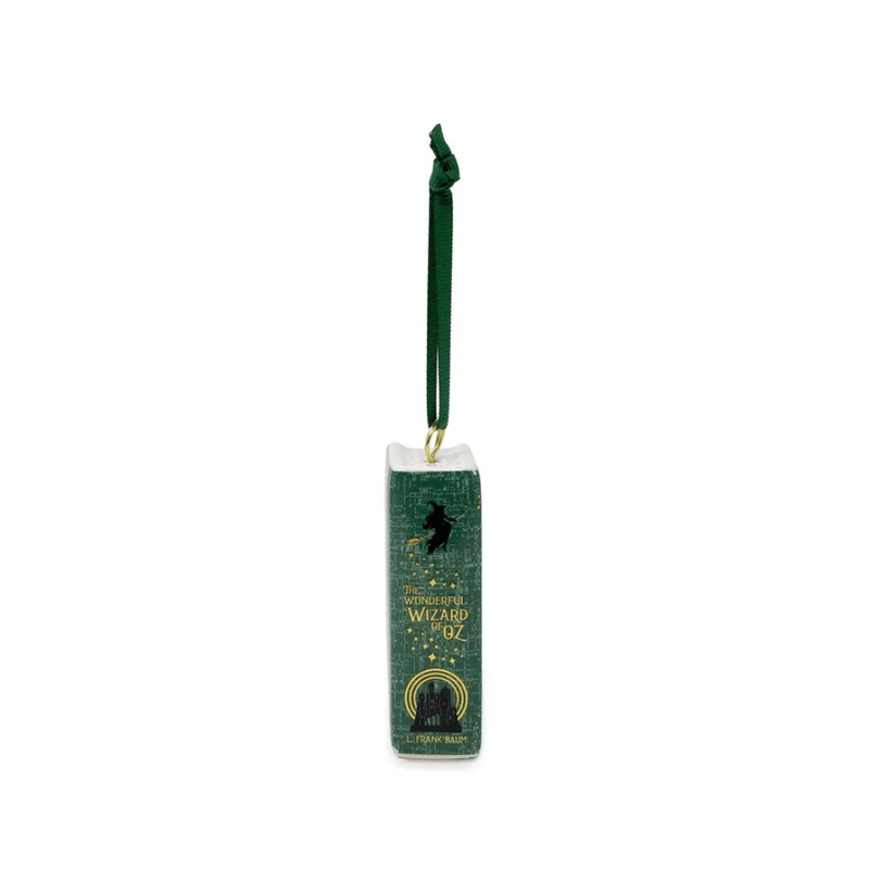 Green spine of The Wonderful Wizard of Oz ceramic book decoration with gold lettering and flying witch illustration