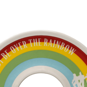Close up of Wizard of Oz rainbow trinket dish showing over the rainbow quote