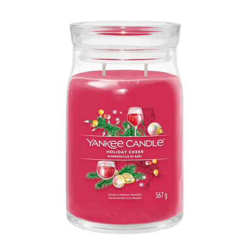 Yankee Candle Holiday Cheer large jar candle with festive label and rich red wax