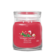 Yankee Candle Holiday Cheer large jar with festive label and rich red wax