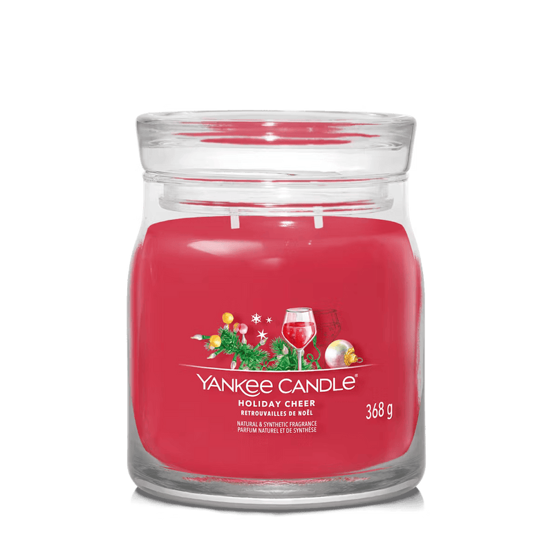 Yankee Candle Holiday Cheer large jar with festive label and rich red wax