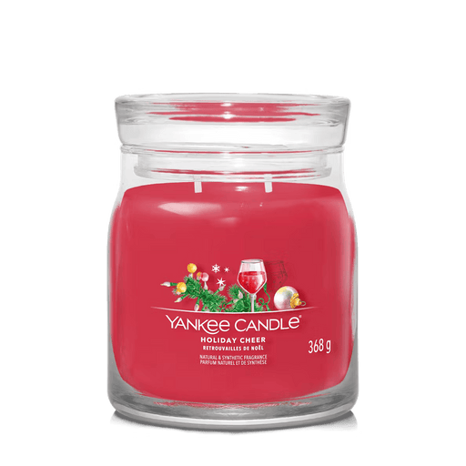 Yankee Candle Holiday Cheer large jar with festive label and rich red wax