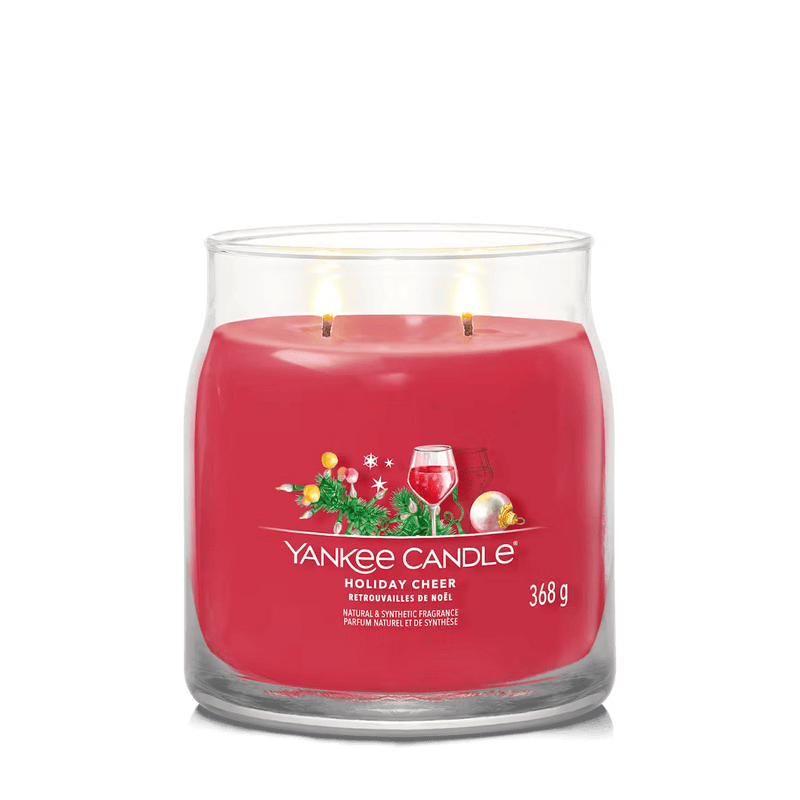 Yankee Candle Holiday Cheer large tumbler with red wax and two wicks