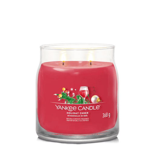 Yankee Candle Holiday Cheer large tumbler with red wax and two wicks