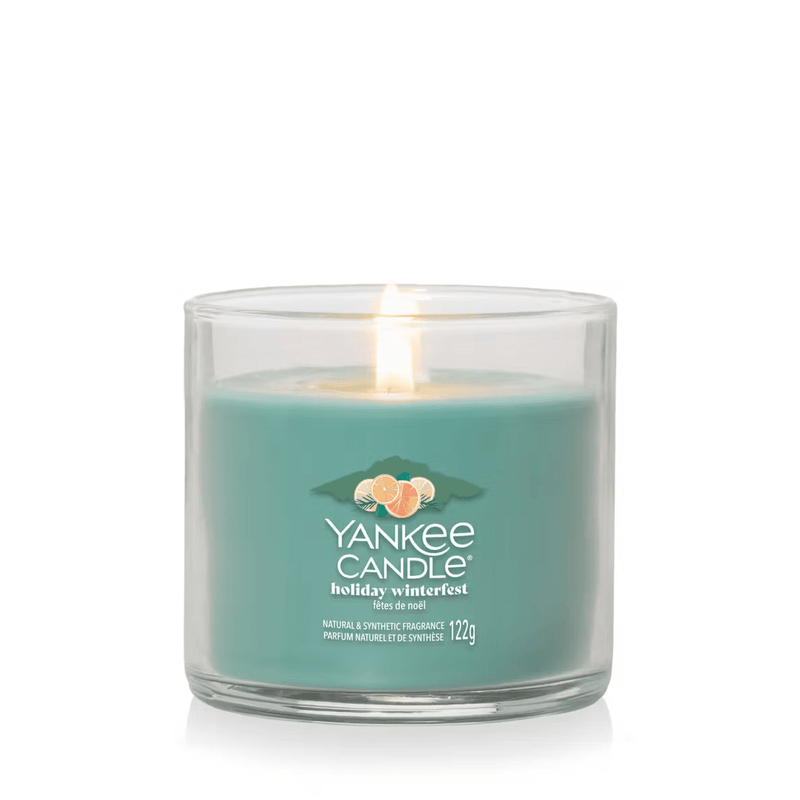 Holiday Winterfest small tumbler lit, teal wax in clear glass
