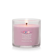 Summit Stargazing small tumbler candle lit, lilac wax in clear glass