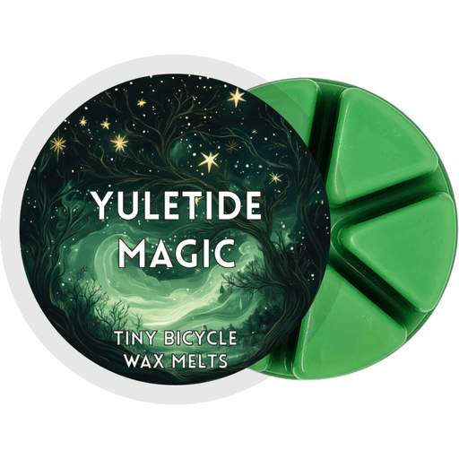 Yuletide Magic green segmented wax melt pot with enchanted forest and glowing stars artwork