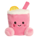 Zelie Pink Lemonade Palm Pals plush toy with smiling face, pink cup body, lemon slice and straw.